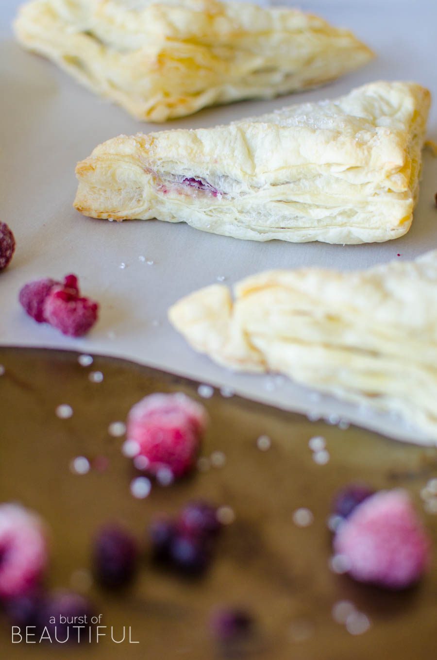 Made with fresh or frozen berries, these homemade berry turnovers are a simple, family-friendly recipe to satisfy your sweet-tooth | A Burst of Beautiful 