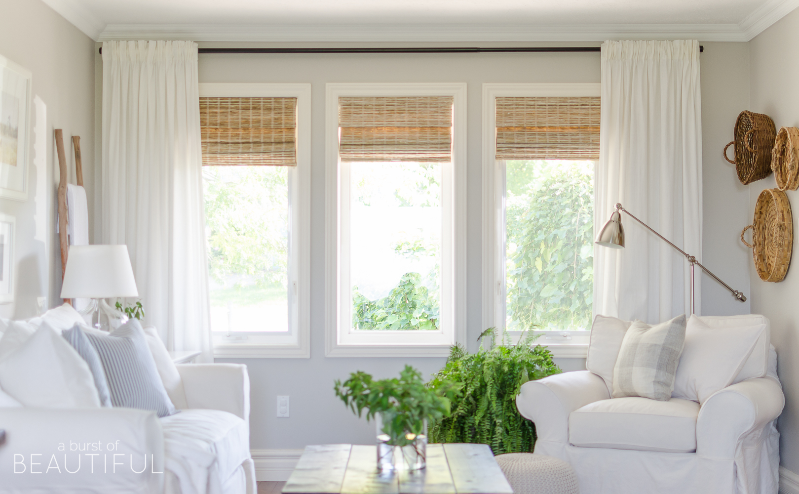 woven wood shades in our living room - a burst of beautiful